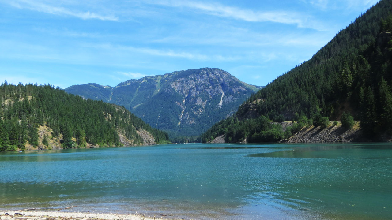 by Sis Woodside: Ross Lake which you drive by along Highway 20 just out of Newhalem. It’s always the most beautiful color of blue you’ve ever seen.
